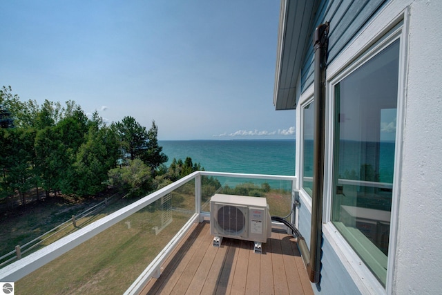4781 E Golfview Dr, Leland, MI 49654 - balcony featuring ac unit and a water view