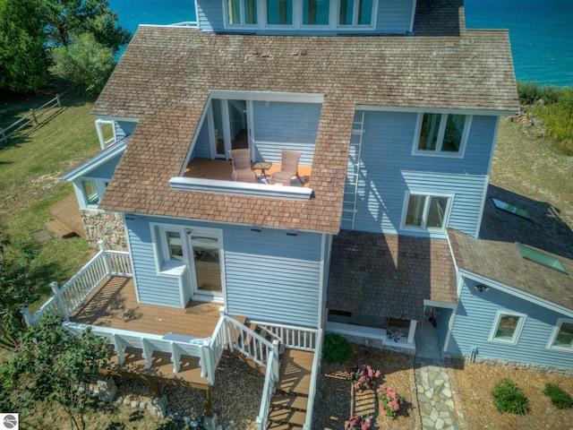 4781 E Golfview Dr, Leland, MI 49654 - back of house featuring a wooden deck