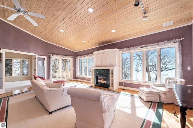 living room with ceiling fan, light wood-style flooring, lofted ceiling, and wooden ceiling