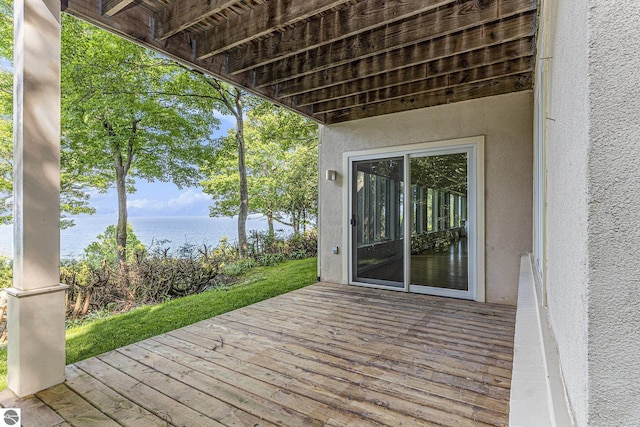 501 Michigan Ave, Frankfort, MI 49635 - wooden terrace featuring a water view