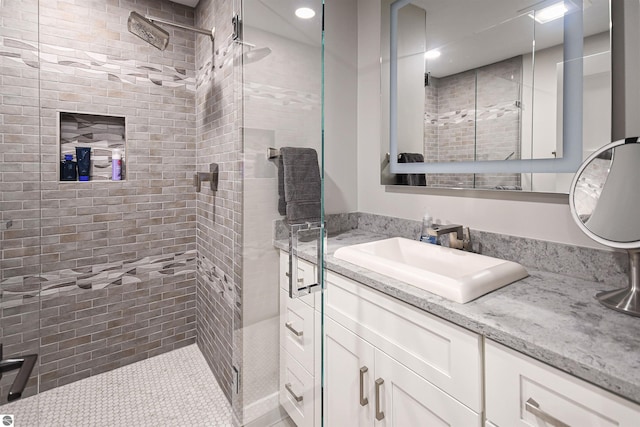 5568 Lakeview Dr, Interlochen, MI 49643 - full bath with a stall shower, vanity, and recessed lighting