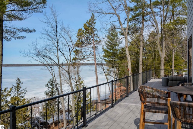 5568 Lakeview Dr, Interlochen, MI 49643 - wooden terrace with a water view