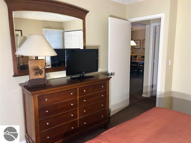 5525 Golfview Ct Unit 10, Williamsburg, MI 49690 - view of bedroom