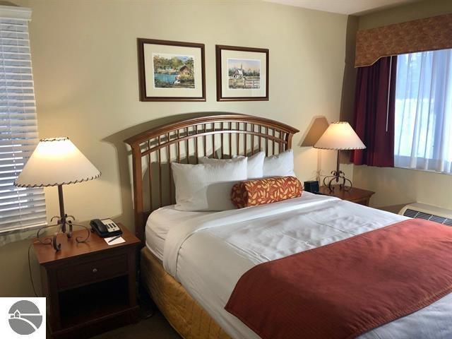 5525 Golfview Ct Unit 10, Williamsburg, MI 49690 - view of bedroom