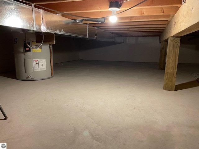 11893 Lillian Lee Dr, Interlochen, MI 49643 - below grade area featuring water heater
