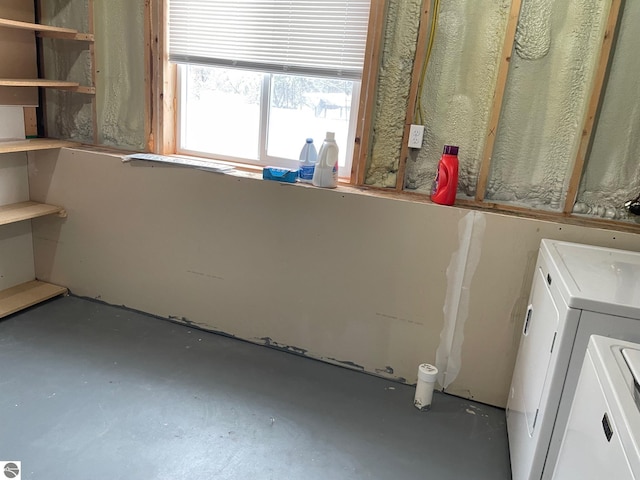 11893 Lillian Lee Dr, Interlochen, MI 49643 - laundry room featuring separate washer and dryer