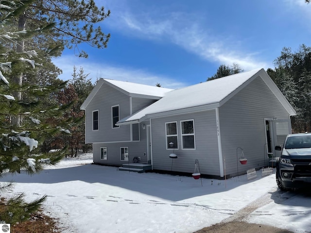 11893 Lillian Lee Dr, Interlochen, MI 49643 - view of snow covered exterior
