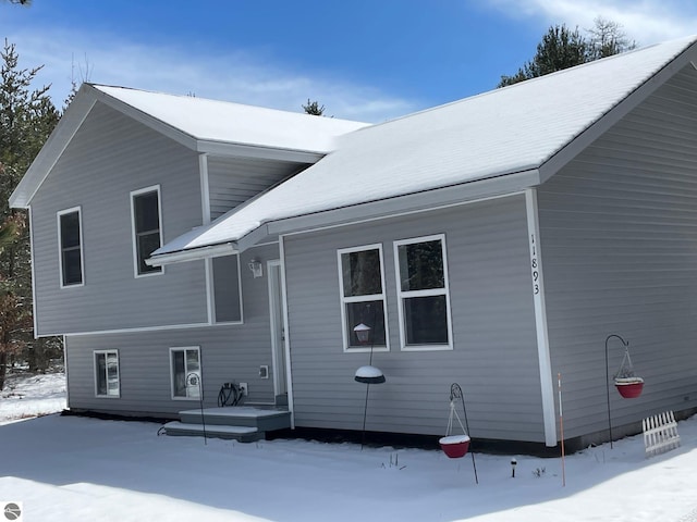 11893 Lillian Lee Dr, Interlochen, MI 49643 - view of snow covered property