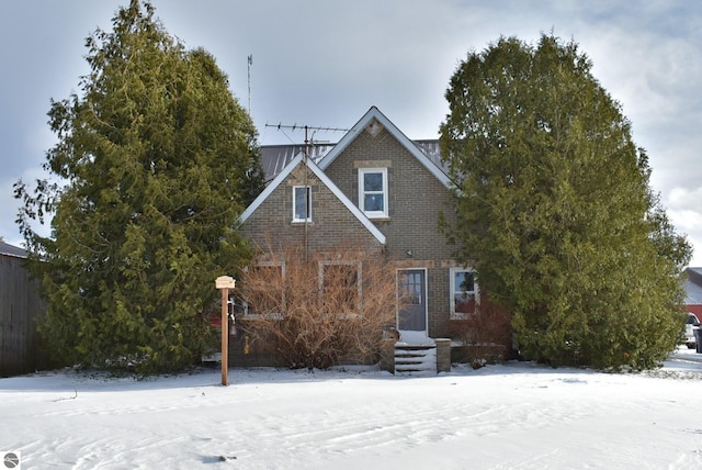 view of front of property featuring brick siding