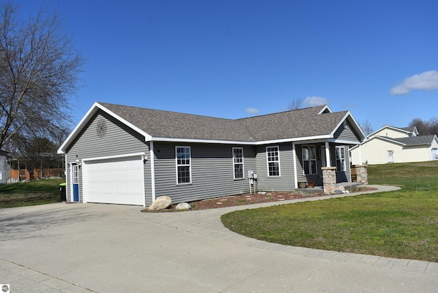 ranch-style house featuring a shingled roof, an attached garage, concrete driveway, and a front lawn