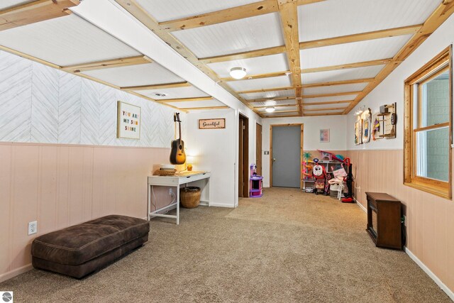 rec room featuring a wainscoted wall, carpet floors, and coffered ceiling
