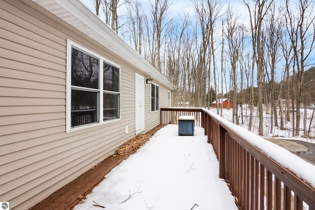 view of snow covered deck