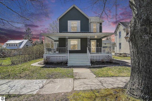 622 Leelanau Ave, Frankfort, MI 49635 - view of front of property featuring covered porch