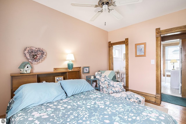 622 Leelanau Ave, Frankfort, MI 49635 - bedroom with ceiling fan and wood finished floors