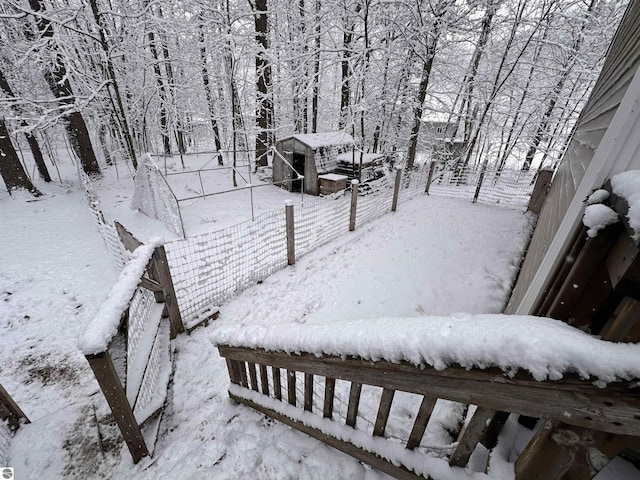 view of yard layered in snow