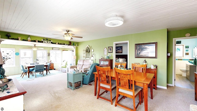 17429 Summit Ct, Barryton, MI 49305 - dining area with ceiling fan, wooden ceiling, and light colored carpet