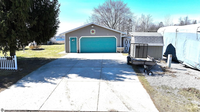 17429 Summit Ct, Barryton, MI 49305 - detached garage featuring a storage shed