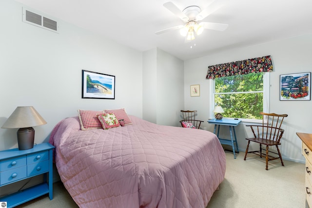 3275 S Sunrise Ln, Lake Leelanau, MI 49653 - bedroom featuring baseboards, visible vents, a ceiling fan, and light colored carpet