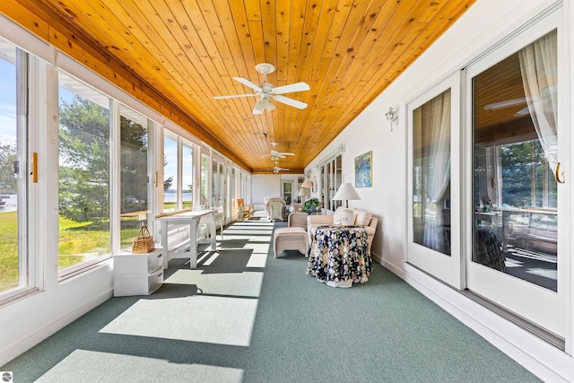 3275 S Sunrise Ln, Lake Leelanau, MI 49653 - sunroom / solarium with wooden ceiling, a ceiling fan, and carpet