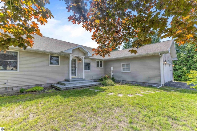 3275 S Sunrise Ln, Lake Leelanau, MI 49653 - view of front of home featuring a front lawn and a shingled roof