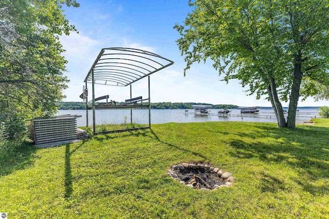 3275 S Sunrise Ln, Lake Leelanau, MI 49653 - view of yard featuring a water view