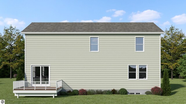 rear view of house featuring a deck and a lawn