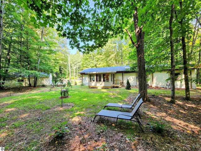 8468 Shorewood Ct, Mancelona, MI 49659 - view of yard with fence