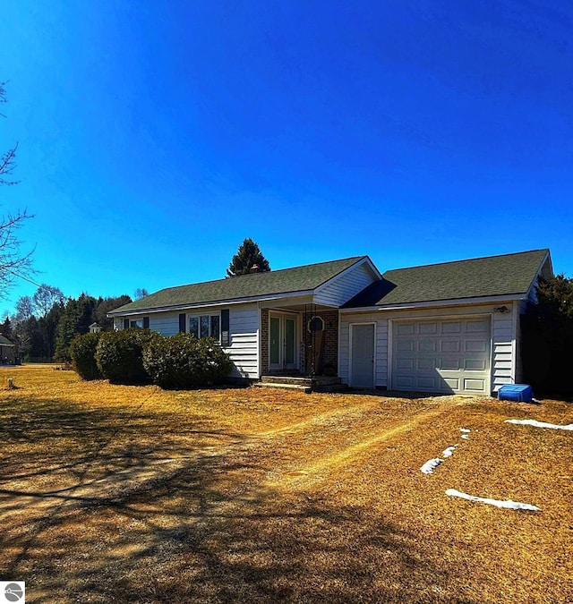 6133 W Airline Rd, Weidman, MI 48893 - ranch-style home featuring an attached garage