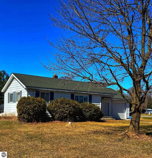 6133 W Airline Rd, Weidman, MI 48893 - ranch-style house featuring a front yard, a garage, and a chimney