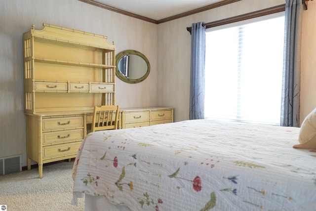 bedroom featuring ornamental molding, visible vents, and carpet