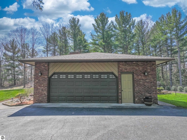 garage featuring fence