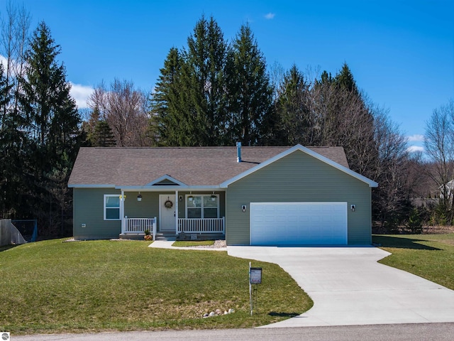single story home with an attached garage, a front yard, covered porch, and driveway