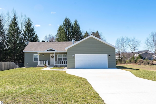 ranch-style house with a garage, concrete driveway, a front yard, and covered porch