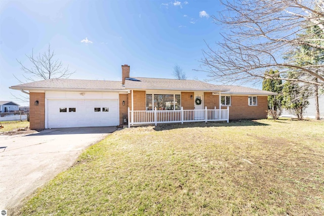 ranch-style house with driveway, a porch, brick siding, an attached garage, and a front yard