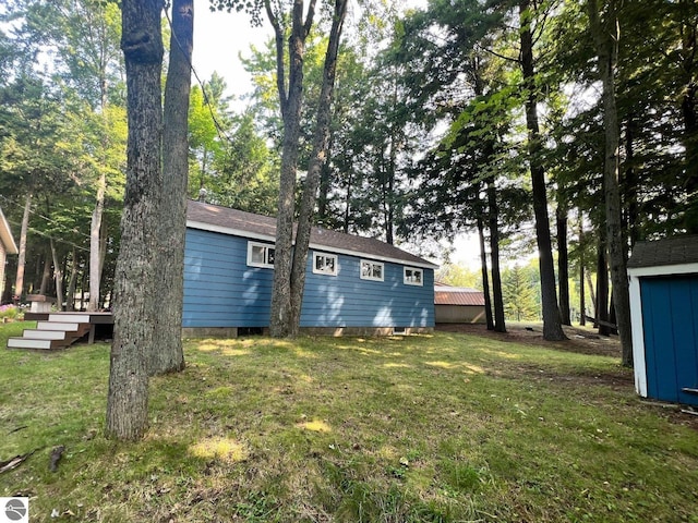 160 White Birch Ln, Cadillac, MI 49601 - view of yard with an outdoor structure