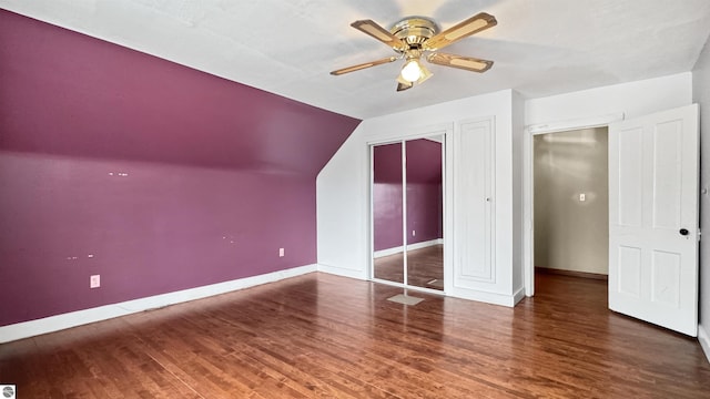 bonus room featuring wood finished floors, baseboards, vaulted ceiling, and ceiling fan