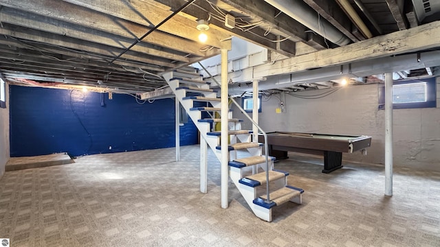 below grade area with billiards and stairway