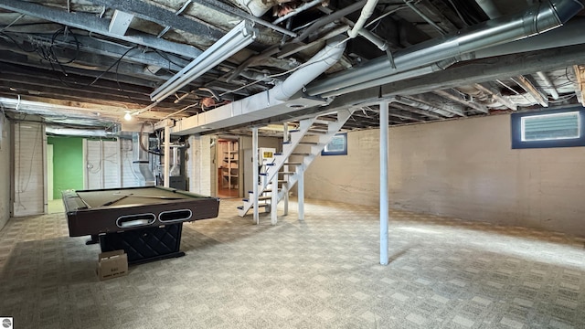 basement with pool table and stairs