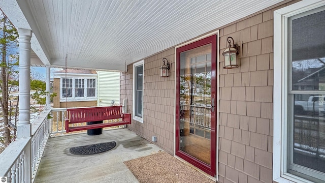 balcony featuring covered porch