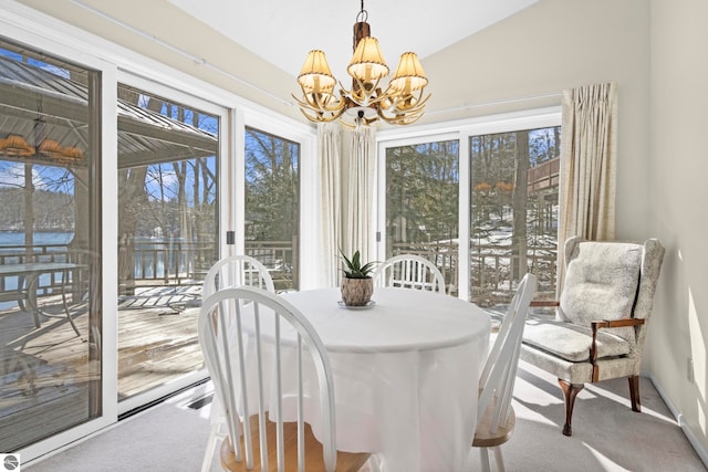 interior space featuring plenty of natural light, visible vents, and a chandelier