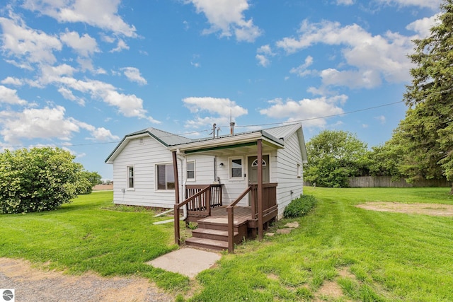 7239 E Rosebush Rd, Mount Pleasant, MI 48858 - view of front of house with metal roof