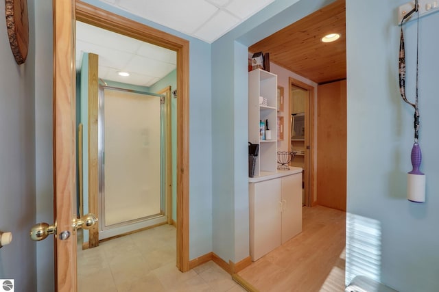 hall with recessed lighting