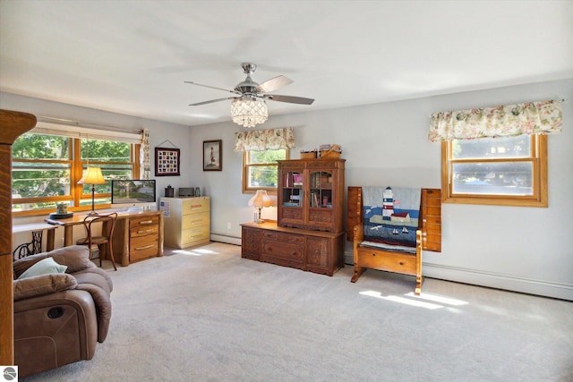 interior space with light carpet, multiple windows, a baseboard radiator, and baseboards