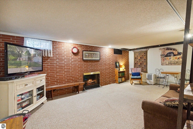 carpeted living area with brick wall, a fireplace, and a textured ceiling