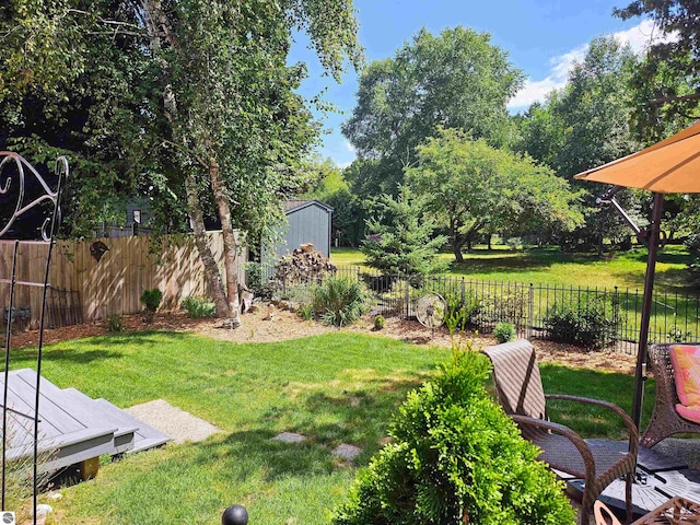 view of yard with a wooden deck