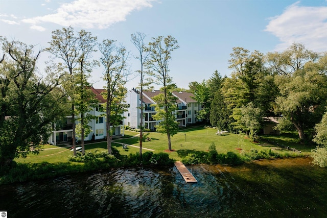 750 Centre Pl Unit 5, Traverse City, MI 49686 - view of green lawn with a water view