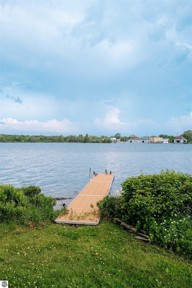 750 Centre Pl Unit 5, Traverse City, MI 49686 - dock area featuring a water view