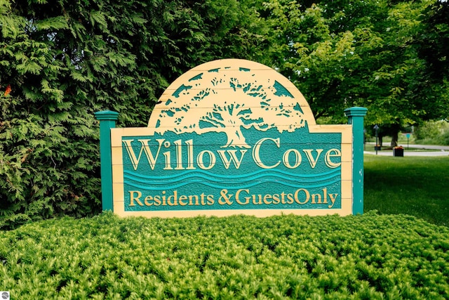750 Centre Pl Unit 5, Traverse City, MI 49686 - community sign featuring a yard