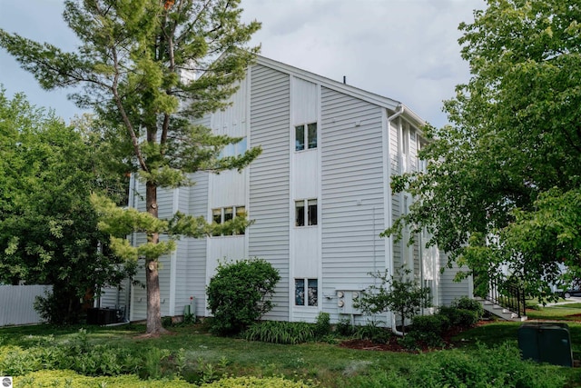 750 Centre Pl Unit 5, Traverse City, MI 49686 - view of side of property featuring a cooling unit