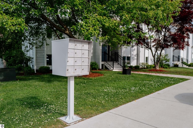 750 Centre Pl Unit 5, Traverse City, MI 49686 - surrounding community with mail area and a yard